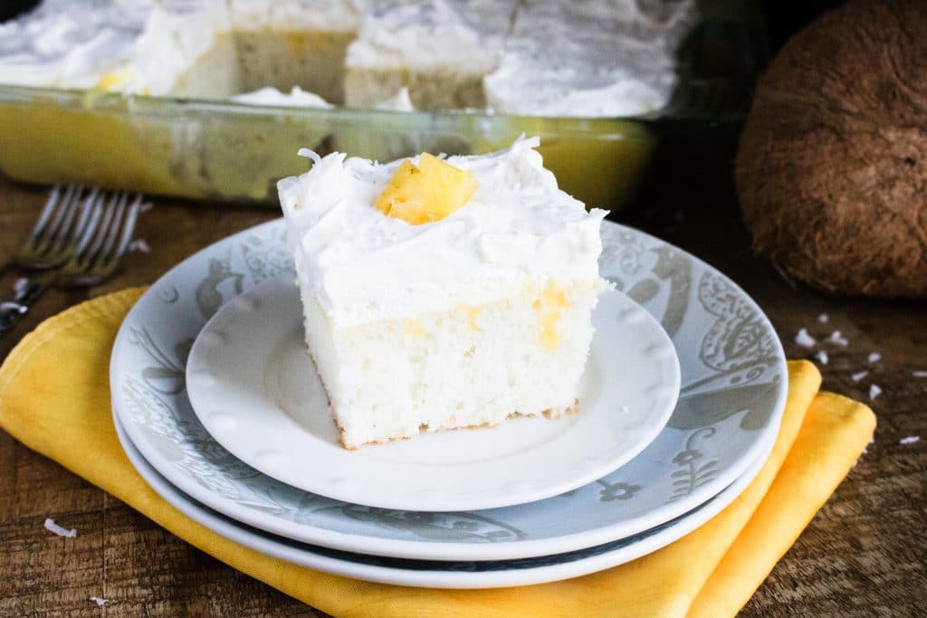 boozy pineapple pina colada poke cake