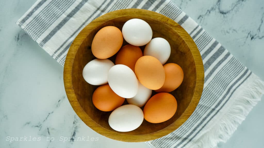 An ice bath is one of the best ways to get a clean peel with a boiled egg since the air fryer doesn’t use water.  I used a 6-quart air fryer. If you have a smaller one, just use as many eggs as you can that will fit in one layer. Do not change the temperature or time.  Store bought eggs peel much easier and cleaner than fresh farm eggs. I have yet to find something that truly works with fresh farm eggs.  The eggs will be very hot when coming out of the air fryer. I tend to let them sit in the air fryer basket for a couple of minutes before handling them. You can also use tongs if you want to get them in the ice bath sooner.