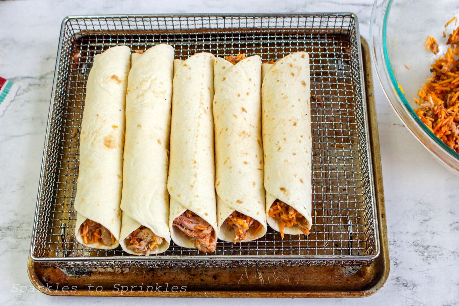Air Fryer BBQ Pulled Pork Taquitos Sparkles to Sprinkles