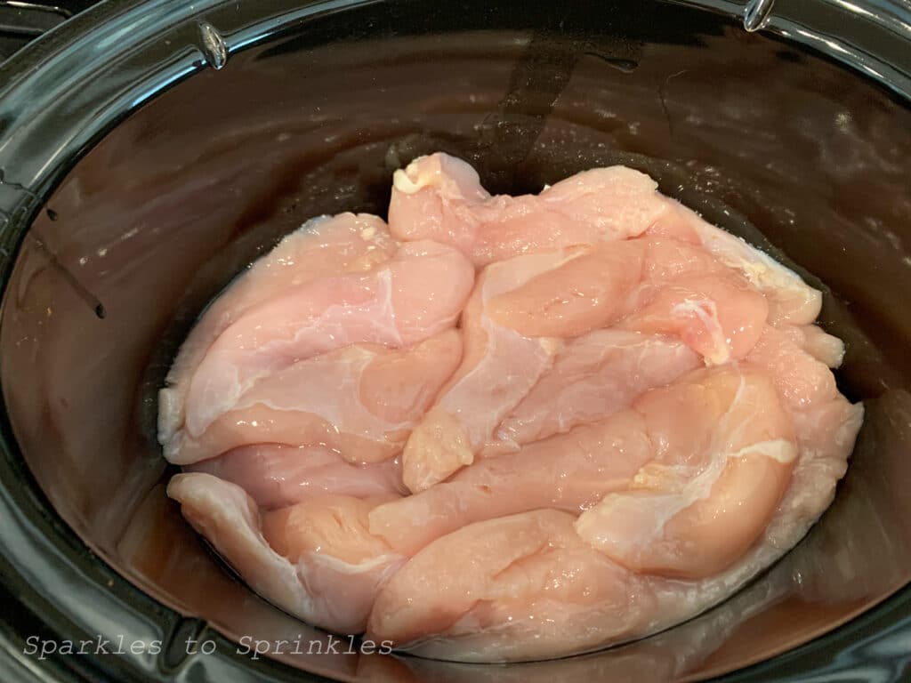 put chicken in the bottom of the pot