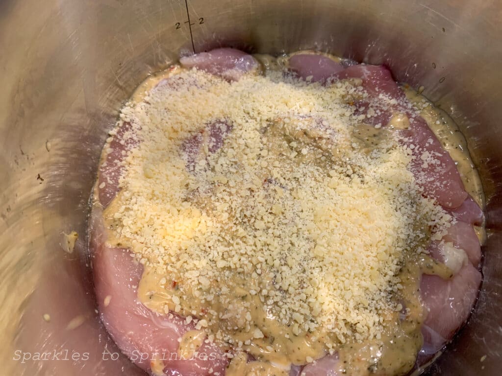 sprinkle parmesan cheese over top