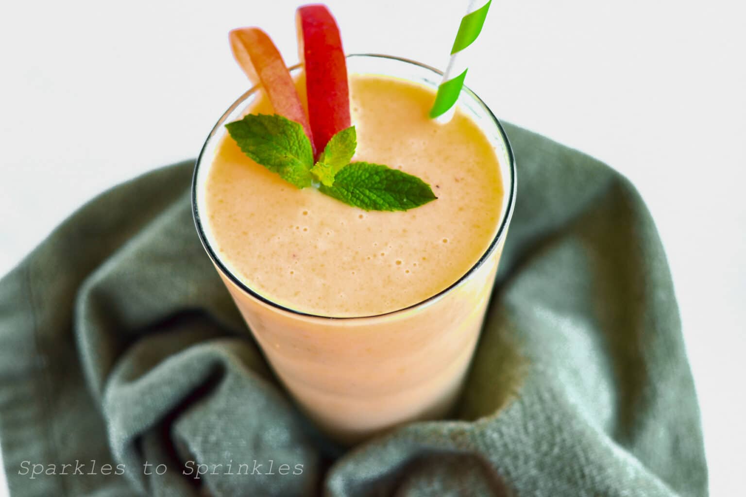A glass of peach smoothie.